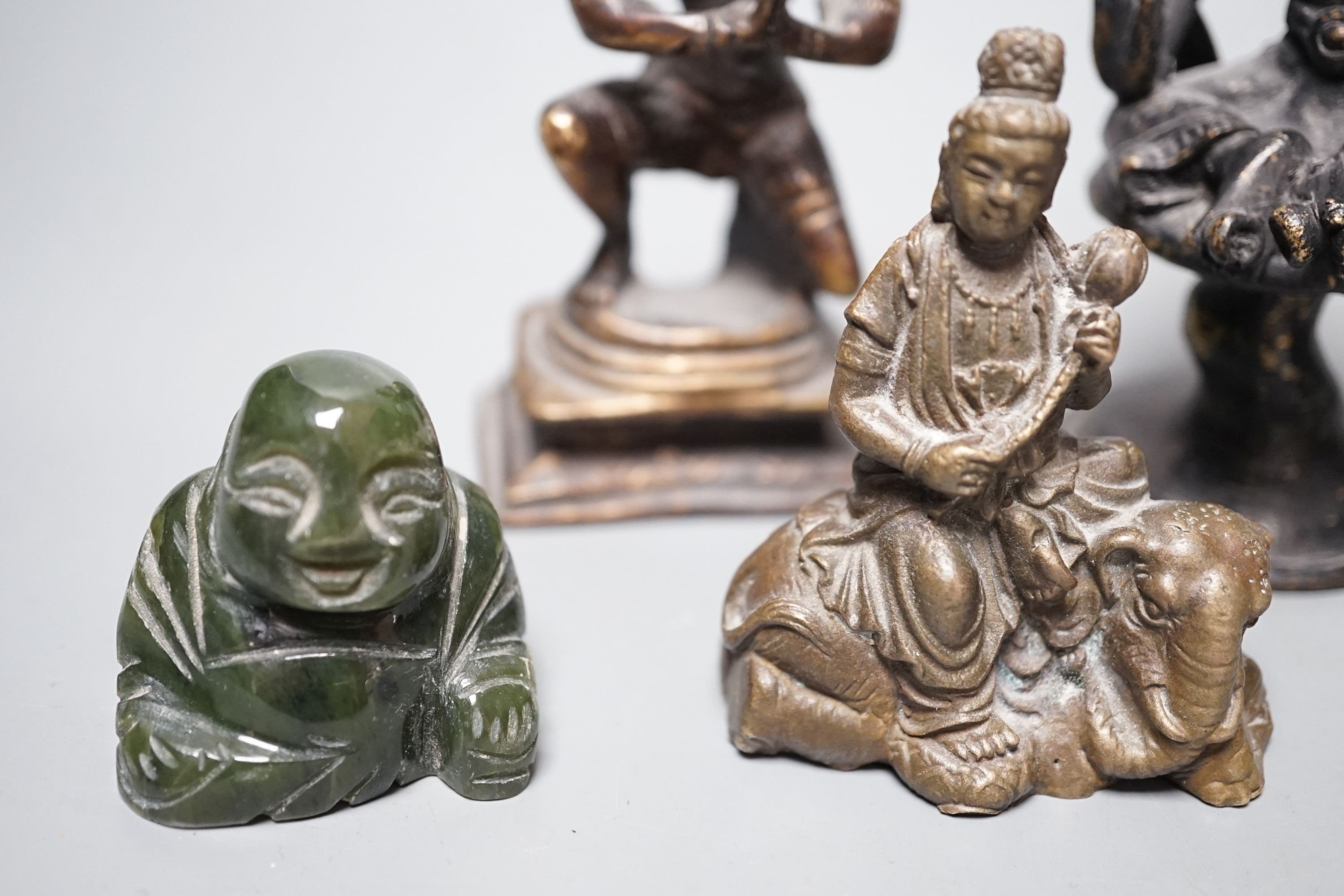 A quantity of Indian and South East Asian bronze and brass models of deities etc.